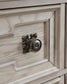 Bruchandi Three Drawer Night Stand