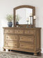 Vandenmore Queen Storage Sleigh Bed with Mirrored Dresser