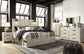 Cambeck Queen Panel Bed with 4 Storage Drawers with Mirrored Dresser, Chest and Nightstand